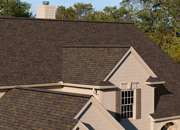 Brown shingled house.